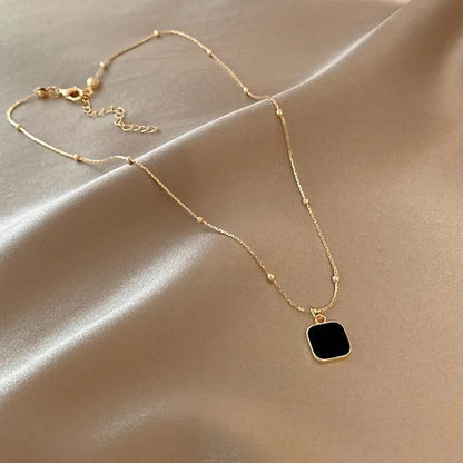 NECKLACE | GOLD ONYX